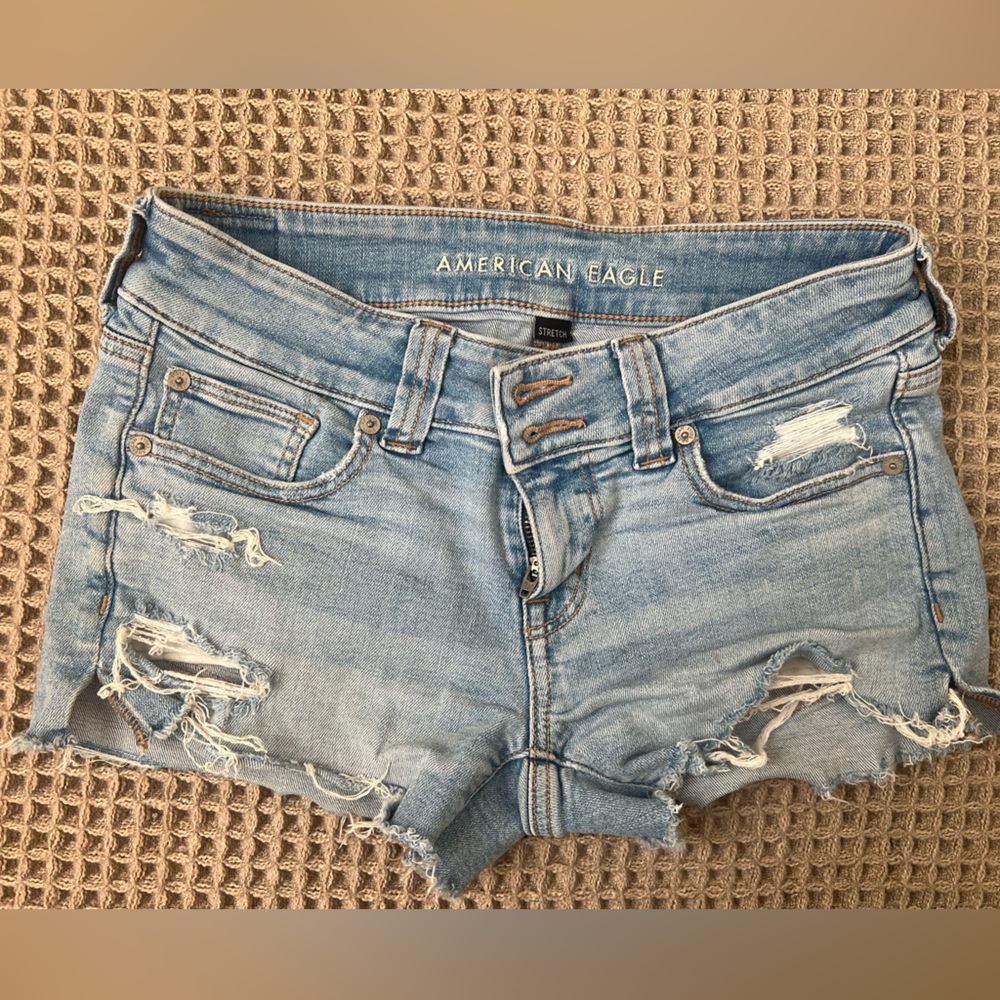 American Eagle Women's Super Low-Rise Shortie stretch distressed denim shorts 4